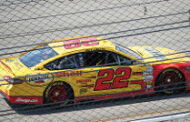 Logano passes Busch in OT for Illinois win