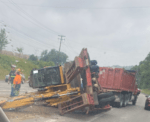 Dump Truck Hauling a Tractor Flipped Over on RT. 19, Expect Delays